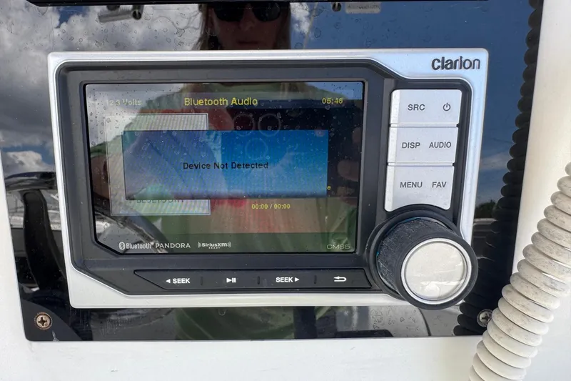 Slide: The Image of Clarion audio system on 2011 Tidewater 230 CC Adventure boat, displaying "Device Not Detected." - 16