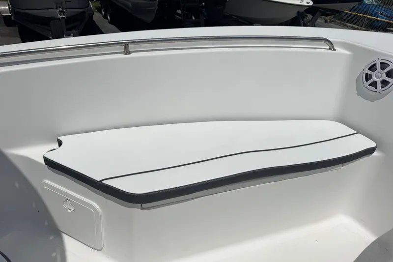 Slide: The Image of Tidewater 230 CC Adventure 2011 boat interior with cushioned seating and speaker. - 28