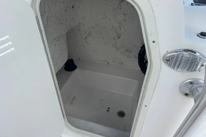 Slide: The Image of Interior view of a 2011 Tidewater 230 CC Adventure boat compartment. - 38