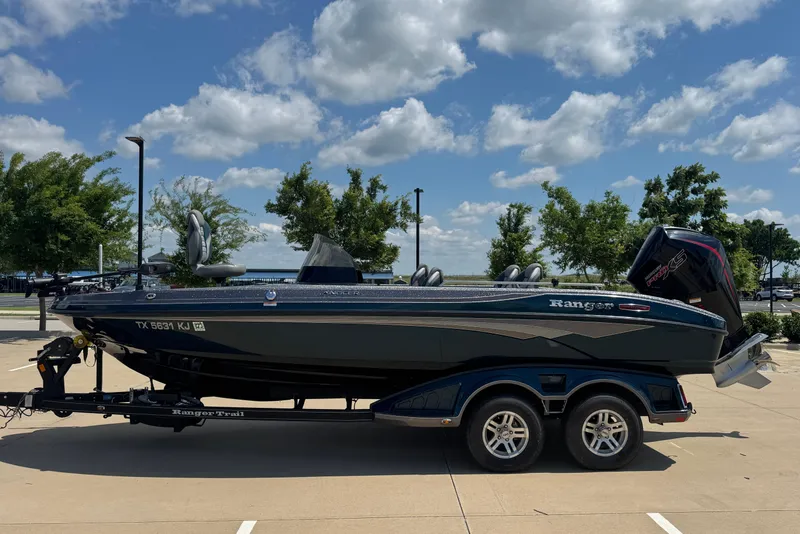 The Image of 2020 Ranger 2080MS Angler boat on trailer under blue sky. - 1