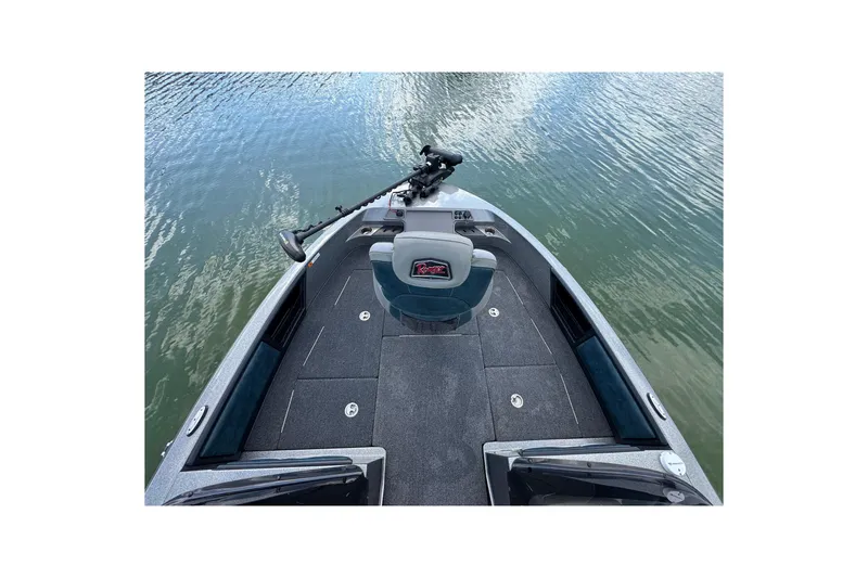 Slide: The Image of 2020 Ranger 2080MS Angler boat on calm water, featuring a sleek deck design. - 12