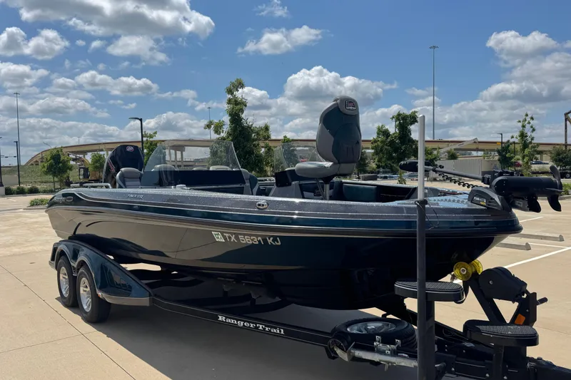 Slide: The Image of 2020 Ranger 2080MS Angler boat on trailer in sunny parking lot. - 4