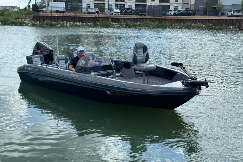 Slide: The Image of 2020 Ranger 2080MS Angler boat on water, featuring sleek design and modern equipment. - 8