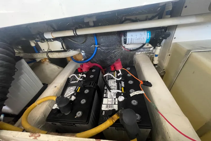 Slide: The Image of Battery compartment of a 2001 Tiara Yachts 2900 Coronet with wiring and components. - 65