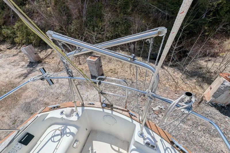 Slide: The Image of Deck view of a 1982 Pearson 323 sailboat with stainless steel rigging. - 47