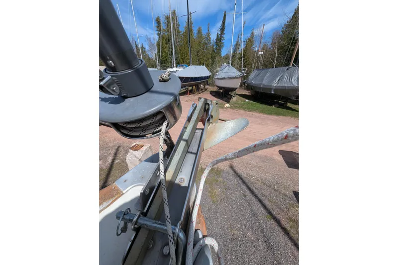 Slide: The Image of Bow of a 1982 Pearson 323 sailboat with anchor and rigging. - 49