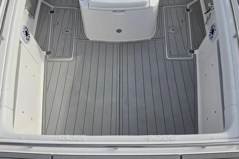 Slide: The Image of Spacious deck of 2025 Caymas 34 CT boat with sleek gray flooring. - 24