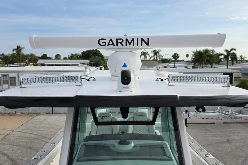 Slide: The Image of 2025 Caymas 34 CT boat with Garmin radar and LED lights on the roof. - 31