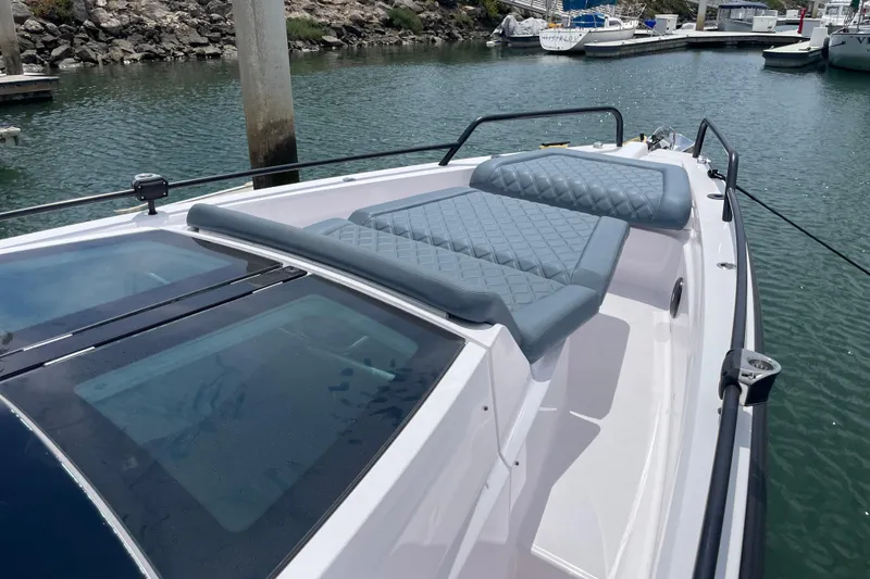 Slide: The Image of 2023 Axopar Brabus 37 XC Cross Cabin with luxurious seating. - 6