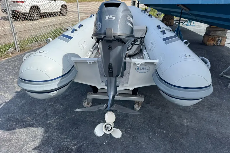 Slide: The Image of 2023 Highfield Ultralite 310 inflatable boat with Yamaha outboard motor on display. - 10