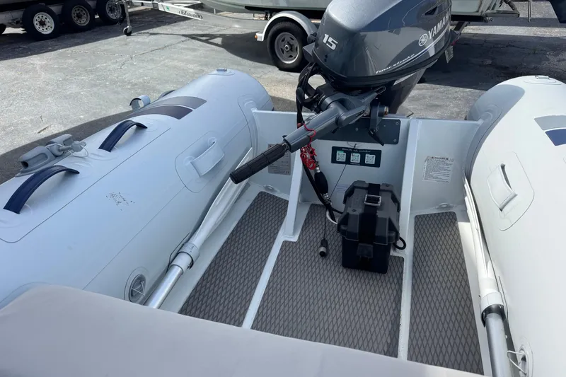 Slide: The Image of 2023 Highfield Ultralite 310 inflatable boat with Yamaha outboard motor. - 6