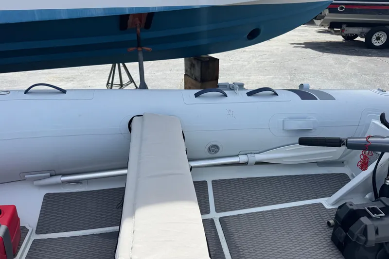 Slide: The Image of 2023 Highfield Ultralite 310 inflatable boat interior with seating and equipment. - 7
