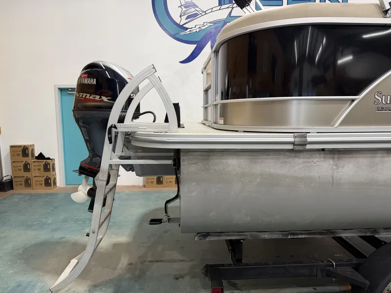 Slide: The Image of 2022 G3 SELECT 20 C pontoon boat with Yamaha motor in a workshop. - 12