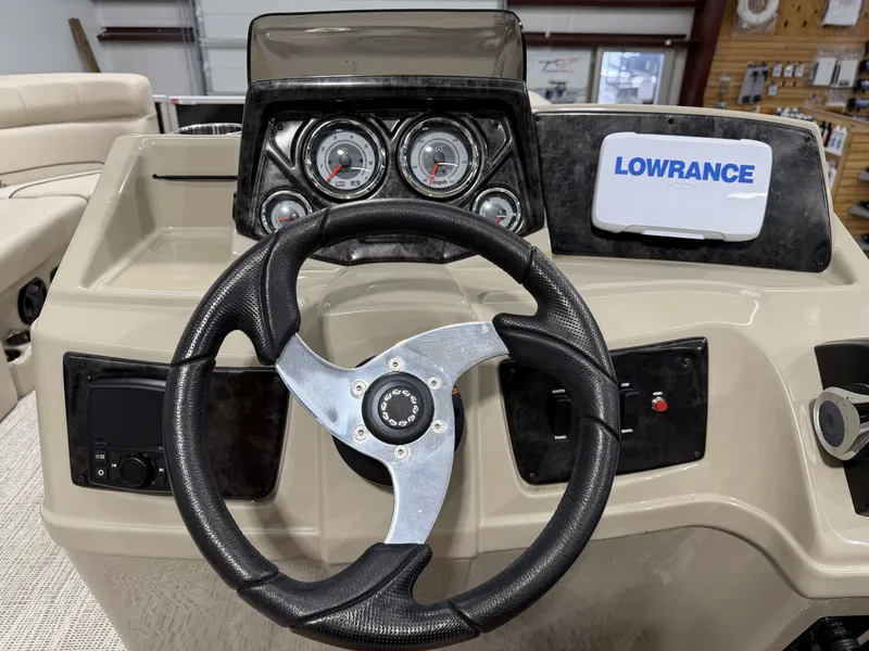 Slide: The Image of Steering wheel and dashboard of a 2022 G3 SELECT 20 C boat. - 8