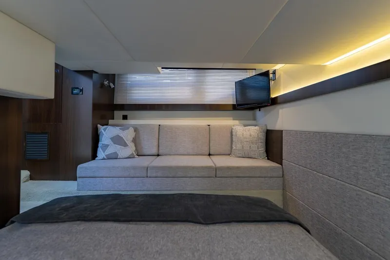Slide: The Image of Interior of 2022 Cruisers Yachts 42 Cantius with modern seating and ambient lighting. - 51