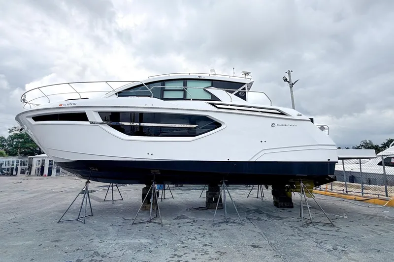 Slide: The Image of 2022 Cruisers Yachts 42 Cantius on dry dock, showcasing sleek design and modern features. - 63