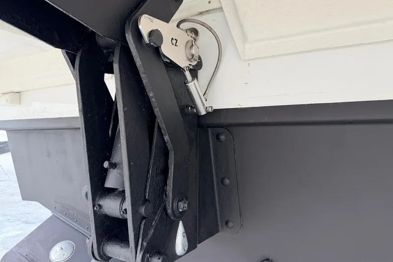 Slide: The Image of Close-up of 2022 Cruisers Yachts 42 Cantius boat hinge mechanism. - 66