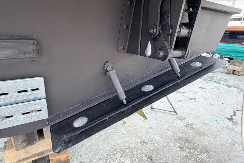 Slide: The Image of 2022 Cruisers Yachts 42 Cantius trim tabs and zinc anodes on hull. - 69