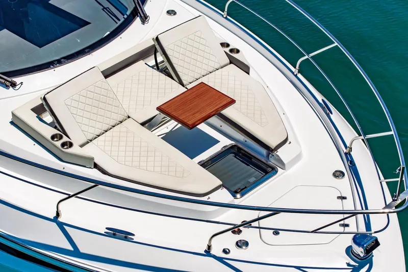 Slide: The Image of Luxurious 2022 Cruisers Yachts 42 Cantius with elegant deck seating and table. - 7