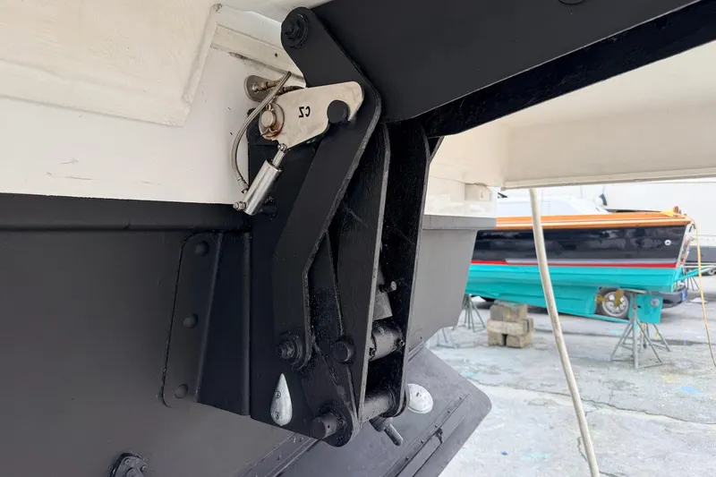 Slide: The Image of Close-up of 2022 Cruisers Yachts 42 Cantius boat hinge mechanism. - 70