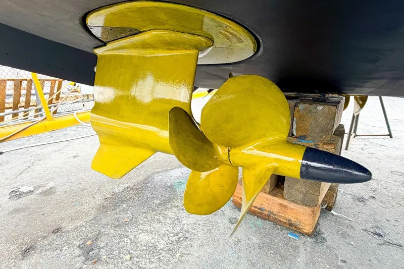 Slide: The Image of Yellow propeller of 2022 Cruisers Yachts 42 Cantius on dry dock. - 72