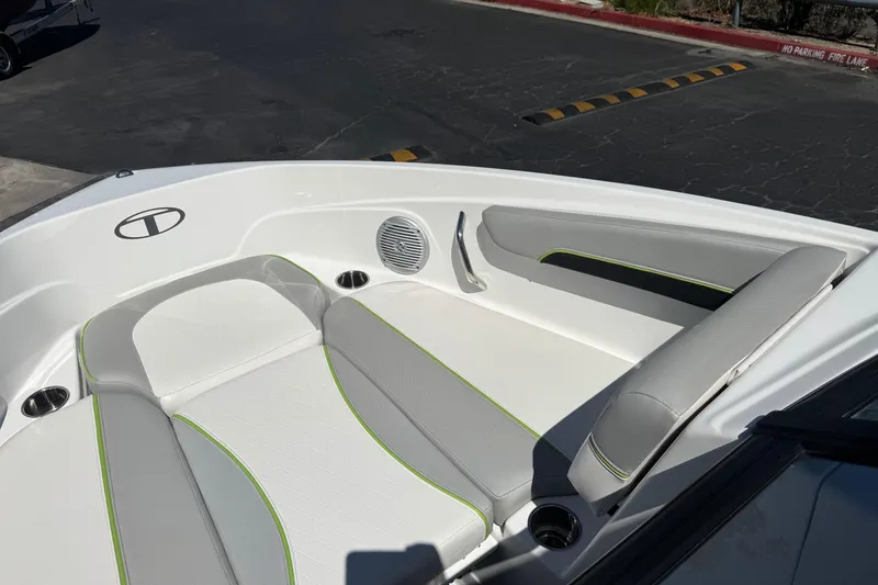 Slide: The Image of 2022 Tahoe 210 Si Limited boat interior with sleek seating and modern design. - 12