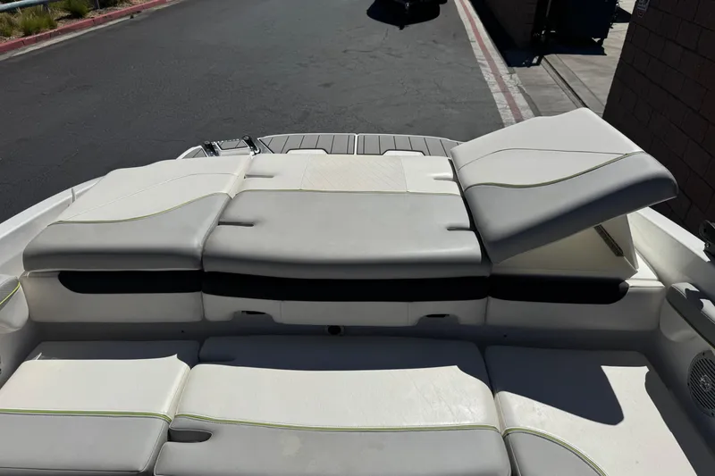 Slide: The Image of 2022 Tahoe 210 Si Limited boat interior with adjustable seating and sleek design. - 20