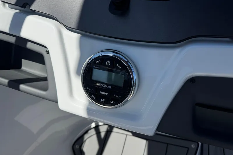 Slide: The Image of Dashboard of 2022 Tahoe 210 Si Limited boat with Kicker audio system. - 24
