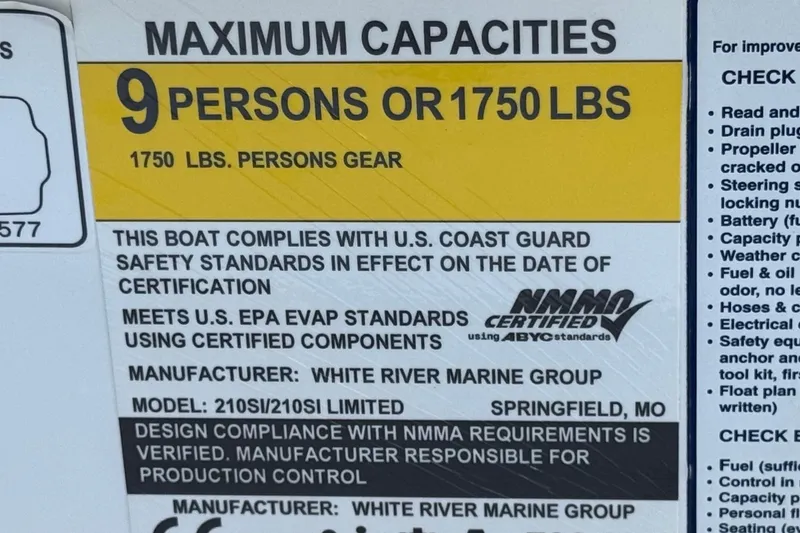 Slide: The Image of 2022 Tahoe 210 Si Limited boat capacity label, 9 persons or 1750 lbs, safety standards compliance. - 29