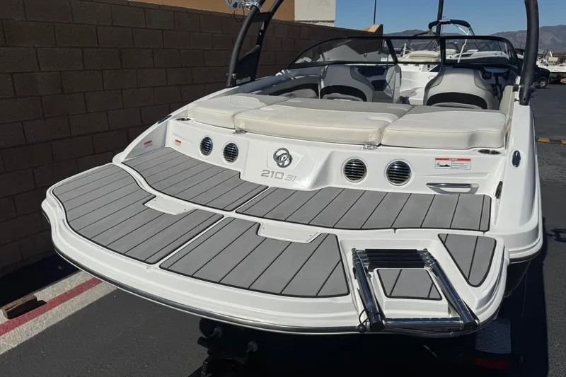 Slide: The Image of 2022 Tahoe 210 Si Limited boat with sleek design and spacious seating. - 6