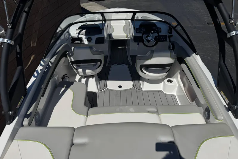 Slide: The Image of Interior of 2022 Tahoe 210 Si Limited boat with seating and steering console. - 8