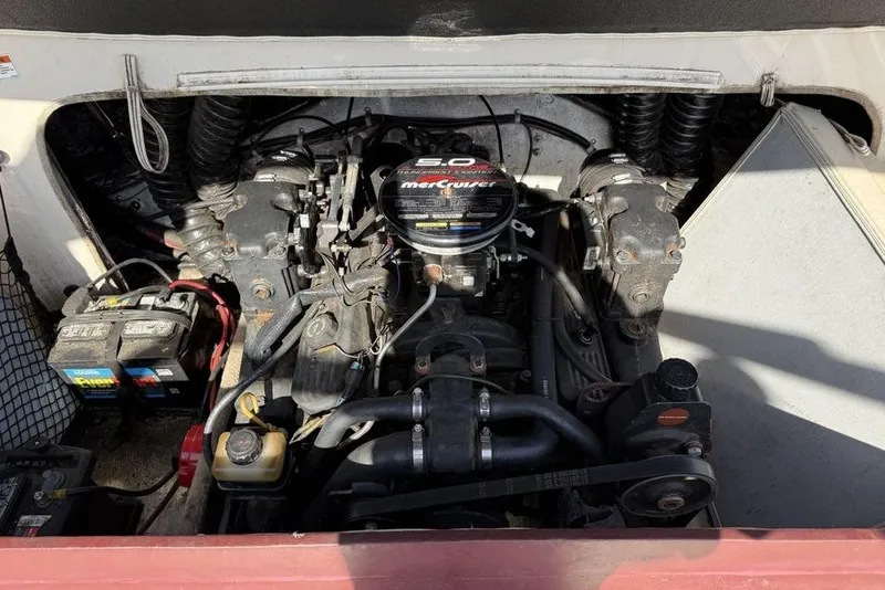 Slide: The Image of Engine compartment of a 1999 Glastron GT 225 boat with MerCruiser 5.0 engine. - 30