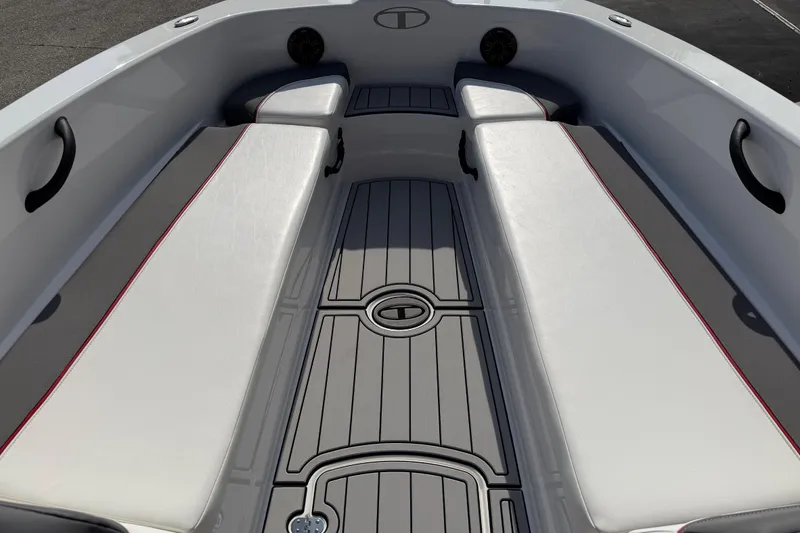 Slide: The Image of 2023 Tahoe T18 boat interior with cushioned seating and sleek design. - 35