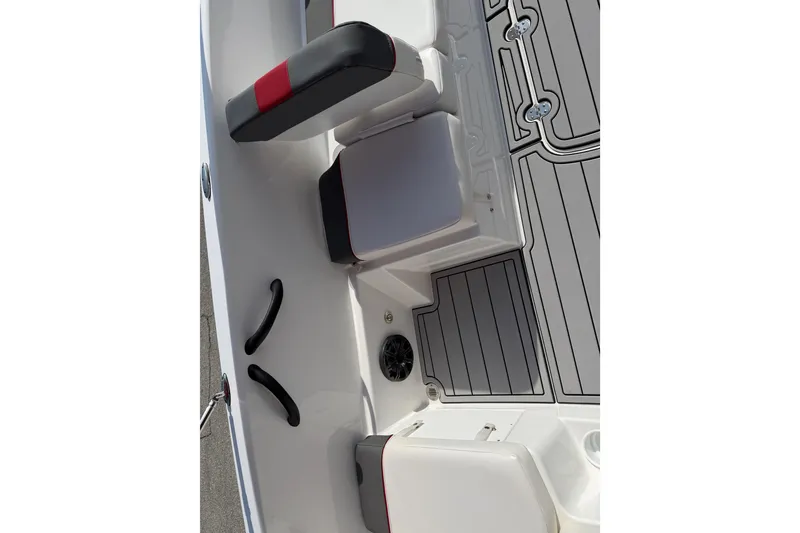 Slide: The Image of 2023 Tahoe T18 boat interior with cushioned seating and sleek flooring design. - 45
