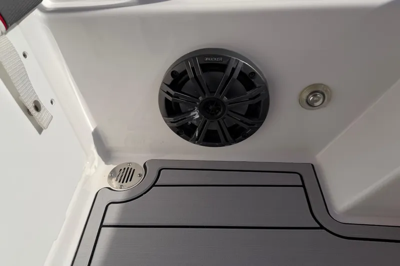 Slide: The Image of 2023 Tahoe T18 boat interior with speaker and deck detail. - 47