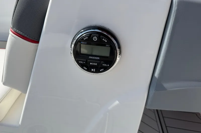 Slide: The Image of Close-up of 2023 Tahoe T18 boat audio control panel. - 50