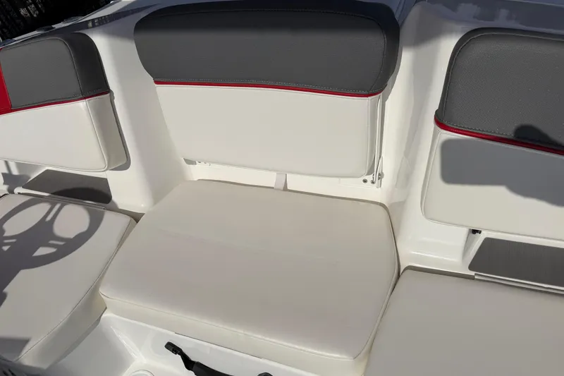 Slide: The Image of 2023 Tahoe T18 boat seating with gray and red accents. - 64