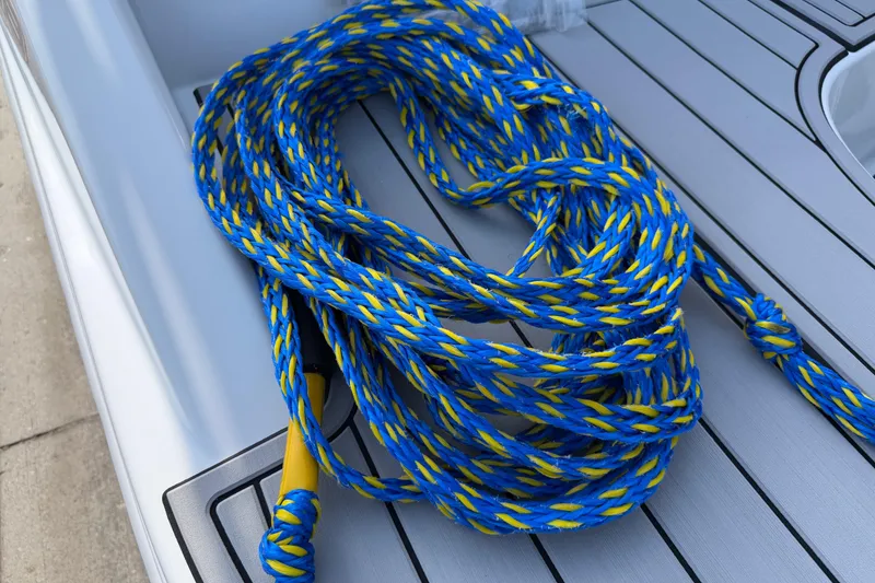 Slide: The Image of Blue and yellow rope on 2023 Tahoe T18 boat deck. - 86
