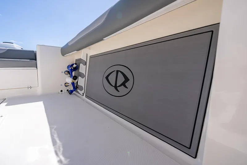 Slide: The Image of 2026 Sea Born LX27 Center Console interior with storage and seating. - 33