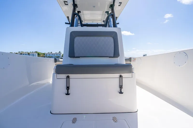 Slide: The Image of 2026 Sea Born LX27 Center Console boat interior with seating and clear blue sky. - 40
