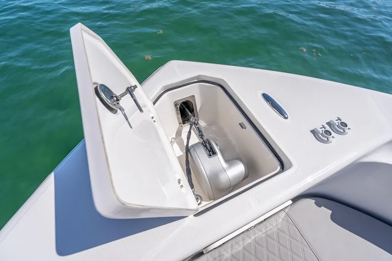 Slide: The Image of Open anchor compartment on 2026 Sea Born LX27 Center Console boat. - 50