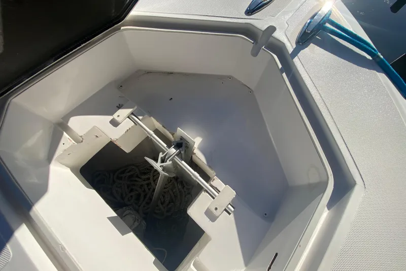 Slide: The Image of Anchor storage compartment on a 2014 SeaHunter 45 Tournament boat. - 28