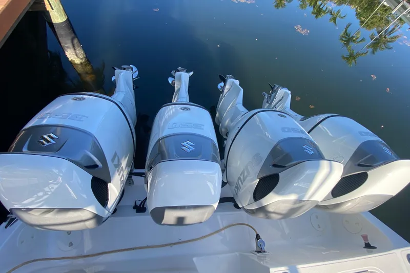 Slide: The Image of Four Suzuki outboard motors on a 2014 SeaHunter 45 Tournament boat. - 44