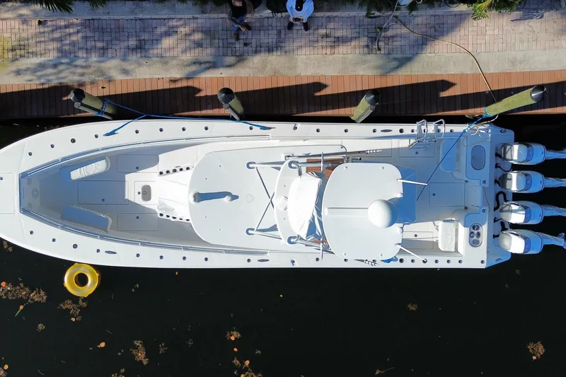 Slide: The Image of Overhead view of 2014 SeaHunter 45 Tournament boat docked with four engines. - 46