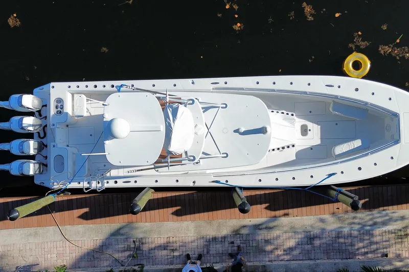 Slide: The Image of Aerial view of 2014 SeaHunter 45 Tournament boat docked with four engines. - 47