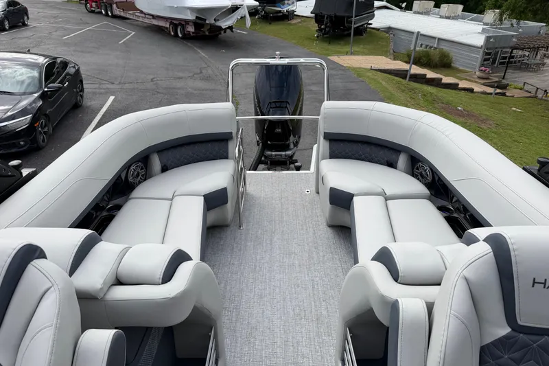 Slide: The Image of 2026 Harris Grand Mariner 250 CWDH pontoon boat with luxurious seating and modern design. - 11