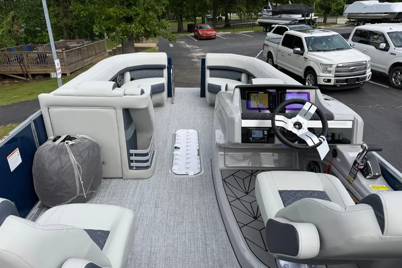 Slide: The Image of 2026 Harris Grand Mariner 250 CWDH pontoon boat interior with modern helm and seating. - 12