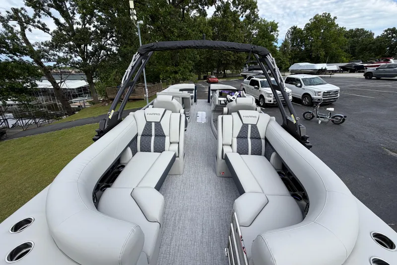 Slide: The Image of 2026 Harris Grand Mariner 250 CWDH pontoon boat with luxurious seating and sleek design. - 15