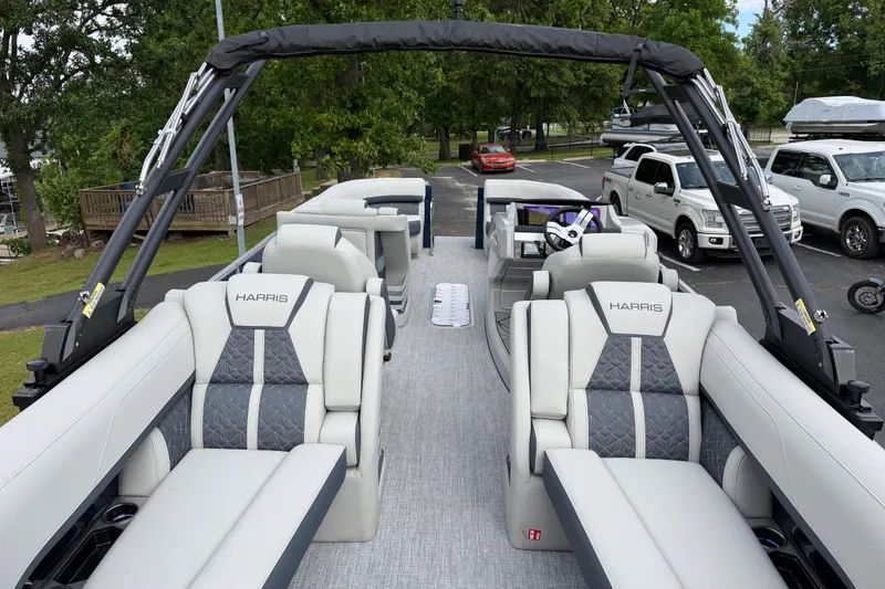 Slide: The Image of 2026 Harris Grand Mariner 250 CWDH pontoon boat with luxurious seating and modern design. - 16