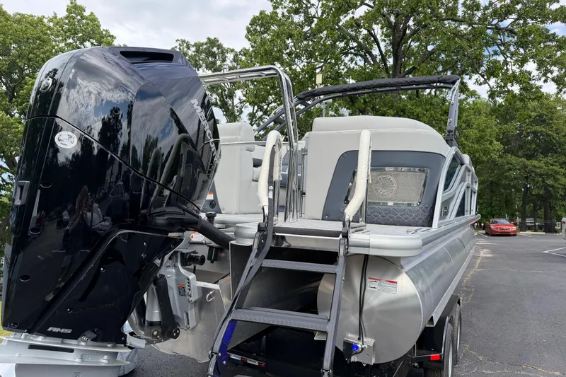 Slide: The Image of 2026 Harris Grand Mariner 250 CWDH pontoon boat with powerful Mercury outboard engine. - 18